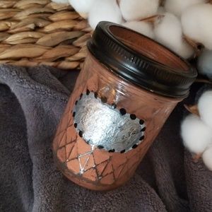distressed copper finish jar.